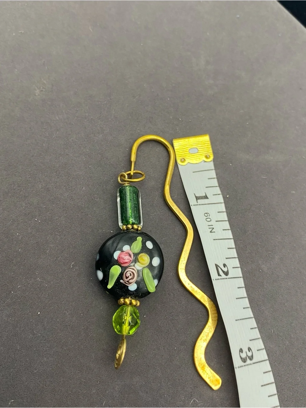 Black and Green Art Glass with Brass Floral Bookmark Charm
